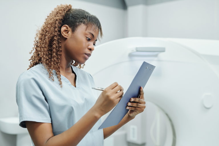 pretty-nurse-of-african-ethnicity-in-uniform-makin-VW6YJK4_